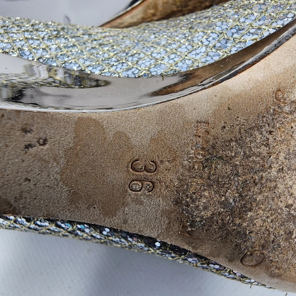 Jimmy Choo Silver Leather Pumps 36